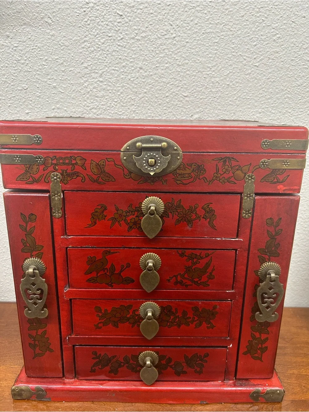 vintage Chinese-style red lacquered wooden jewelry chest ornate brass-toned